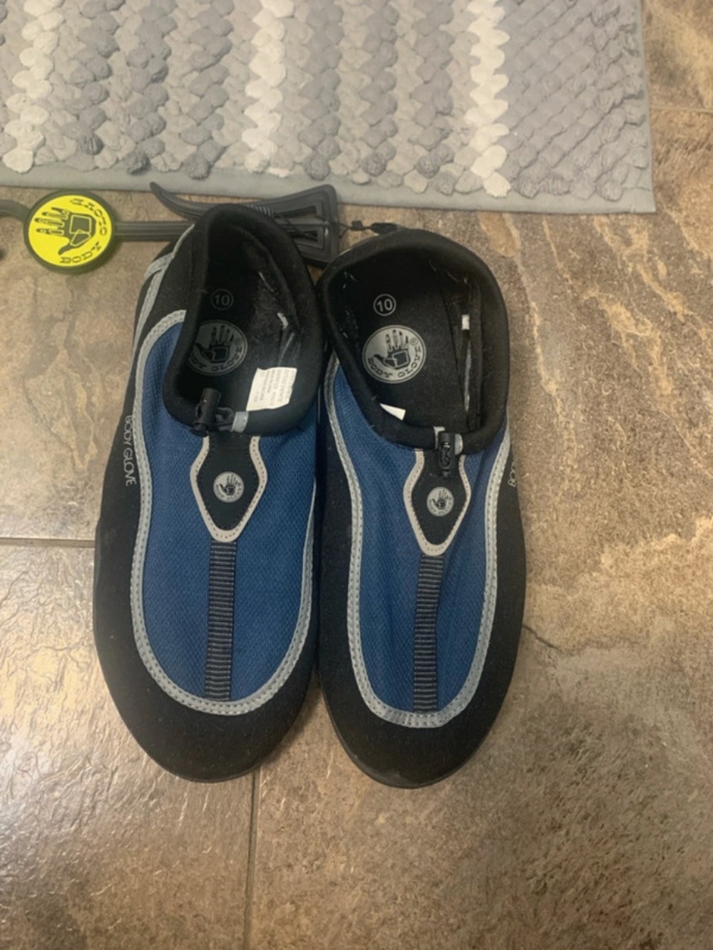Men’s body glove water shoes.